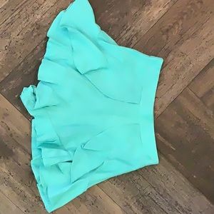 DO + BE turquoise ruffled mini skort